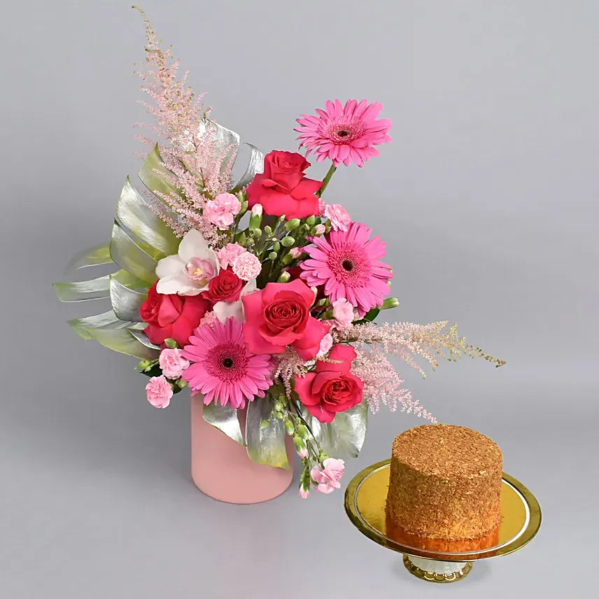 Magical Grace Flower Arrangement with Cake | Elegant Pink Blooms in Glass Vase