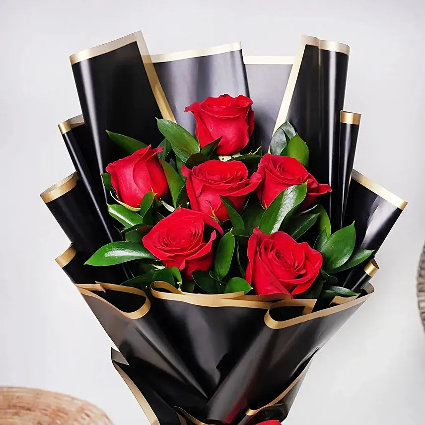 Fresh Roses Paired with Delicious Fudge Cake